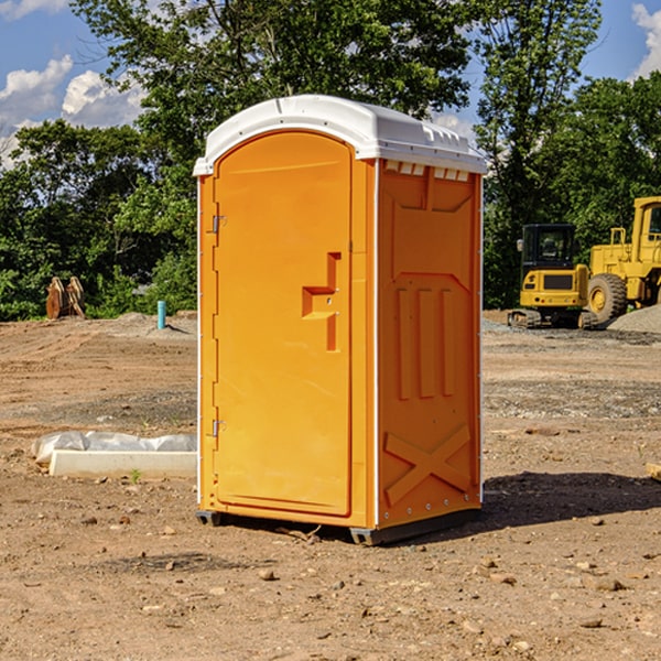 how often are the portable restrooms cleaned and serviced during a rental period in Quogue